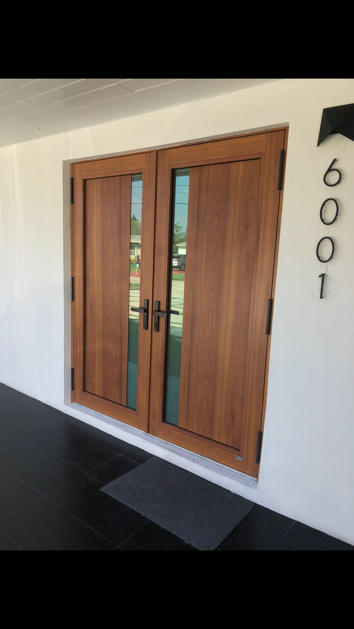 Mr. Doorman project — wooden double doors with glass panels